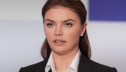 Алина Кабаева и Дмитрий Губерниев удивили публику парными нарядами